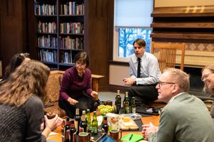 Members of the 2019-20 Humanities Center Faculty Research Seminar meeting in the AGH library