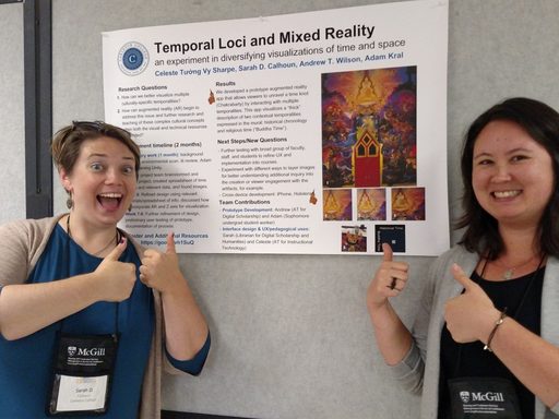 Sarah and Celeste give thumbs up next to their poster for dh2017