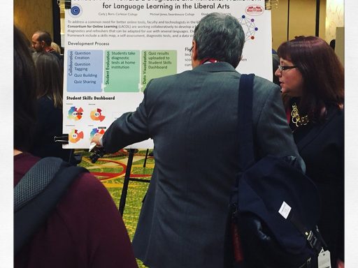 Carly answers questions at a poster session; man in suit jacket with back to camera gestures at a series of visualizations on the poster.