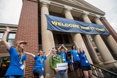 A group of New Student Week leaders welcome incoming students to campus