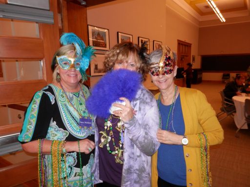 Sara, Tami, and Beth dressed up for the Mardi Gras lunch