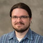 headshot of Evan Rich