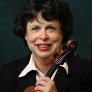 Mary Horozaniecki holding a violin