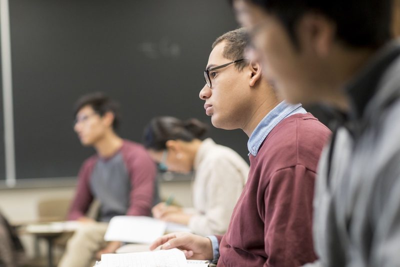 Students sit attentively in class