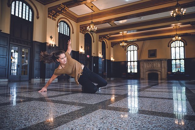 ​Elise Erickson slides across the polished terrazzo floor of Great Space 