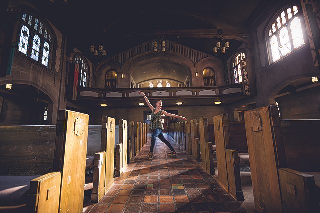 ​Ellis Johnston dances in the aisle between the Chapel pews