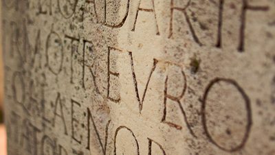 Latin text carved in stone