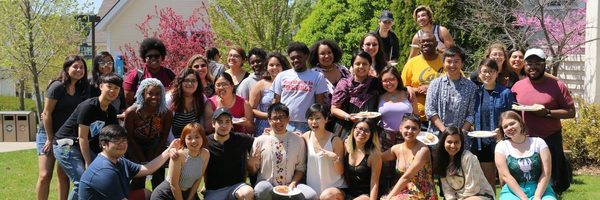 34 members of QTPOC on a sunny day on campus