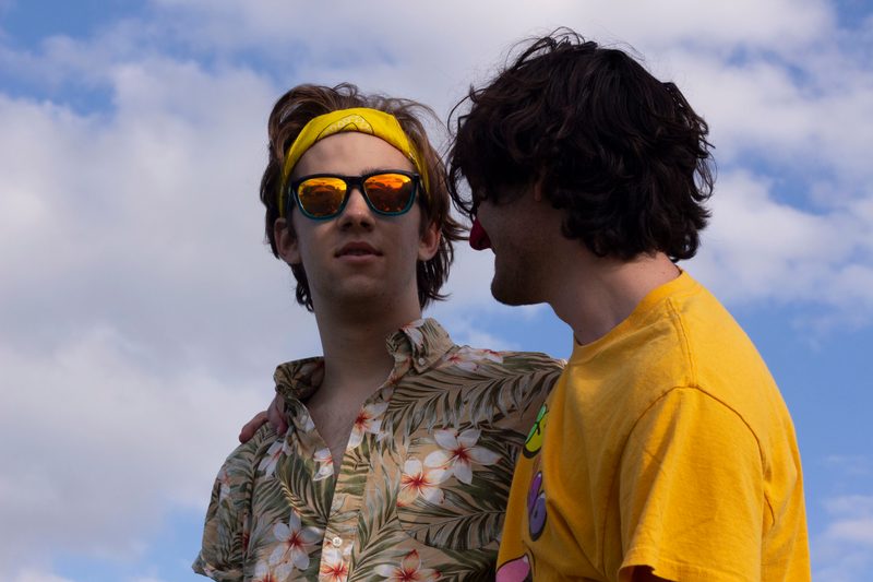 Jack and Lucas, the latter looking at the former instead of at the camera