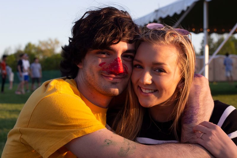 Lucas and Anne hugging and smiling for the camera
