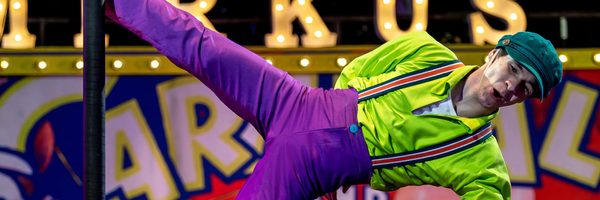 A young man performs in a circus