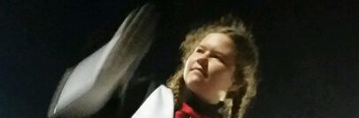 Young woman in a marching band uniform