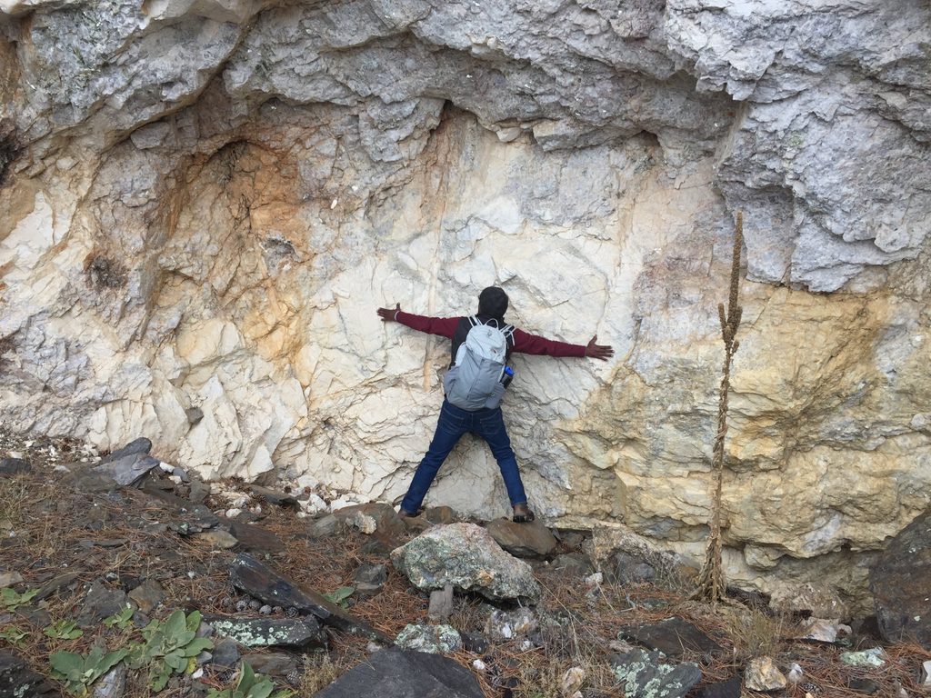 man hugging a crystal