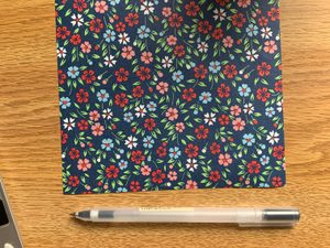 origami paper and pen