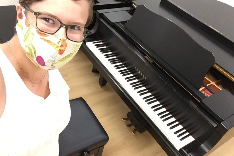 Greta practicing piano