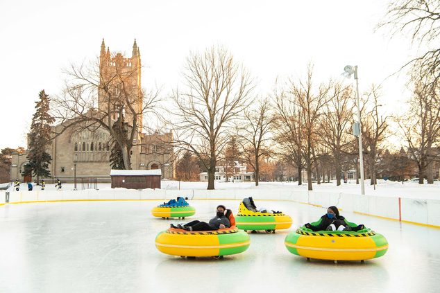 Bumper cars on an ice rink on the bald spot during the winter