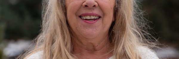 A profile photo of Carleen smiling
