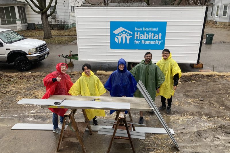 My new friends and I rocking our ponchos to protect us from the rain.