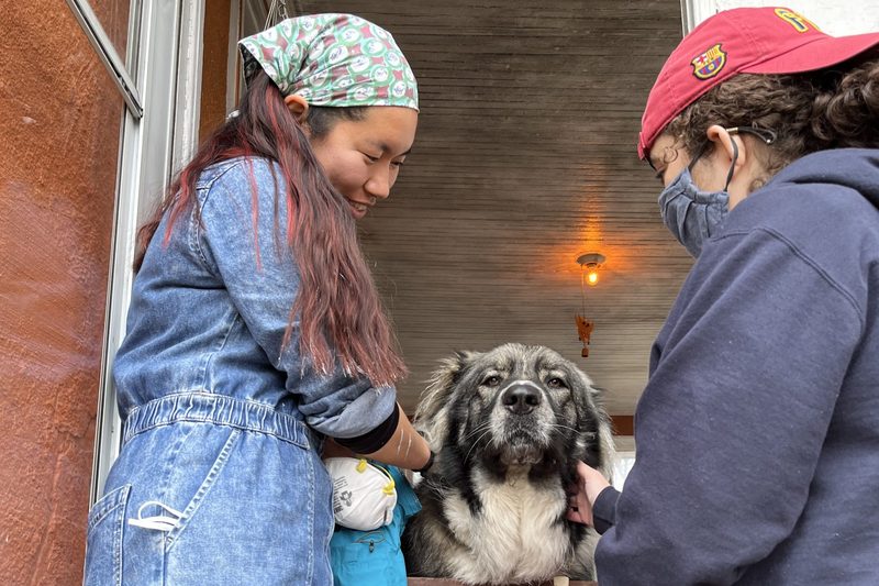 Eunice and I giving love to Coco, the dog.