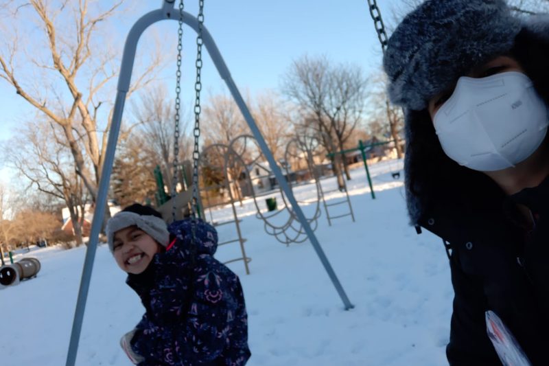 My mentee, Zoe, and I enjoying a beautiful winter day in the swings.
