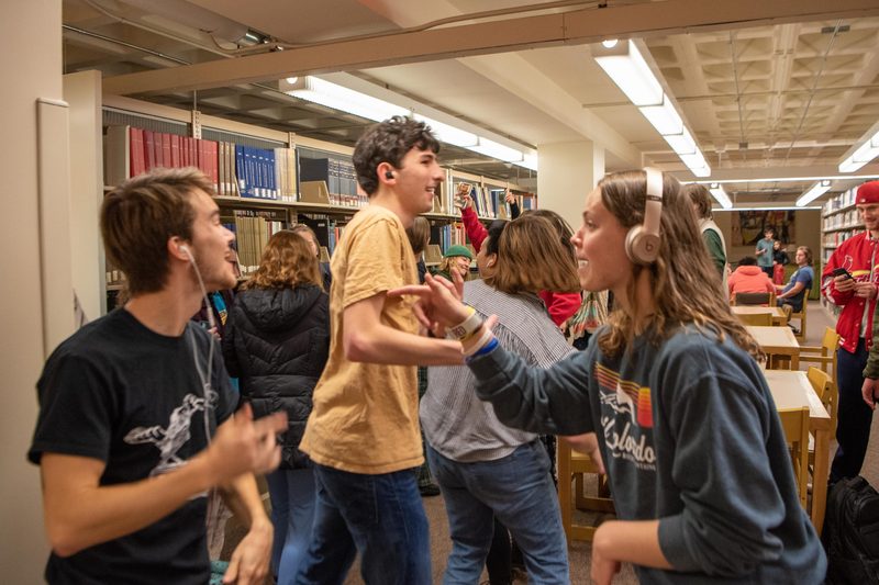 Students dancing in the Library.