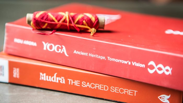 Stack of two books: Mudra and Yoga by Indu Arora