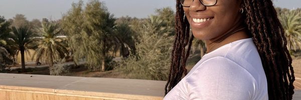 photo of woman smiling and posing