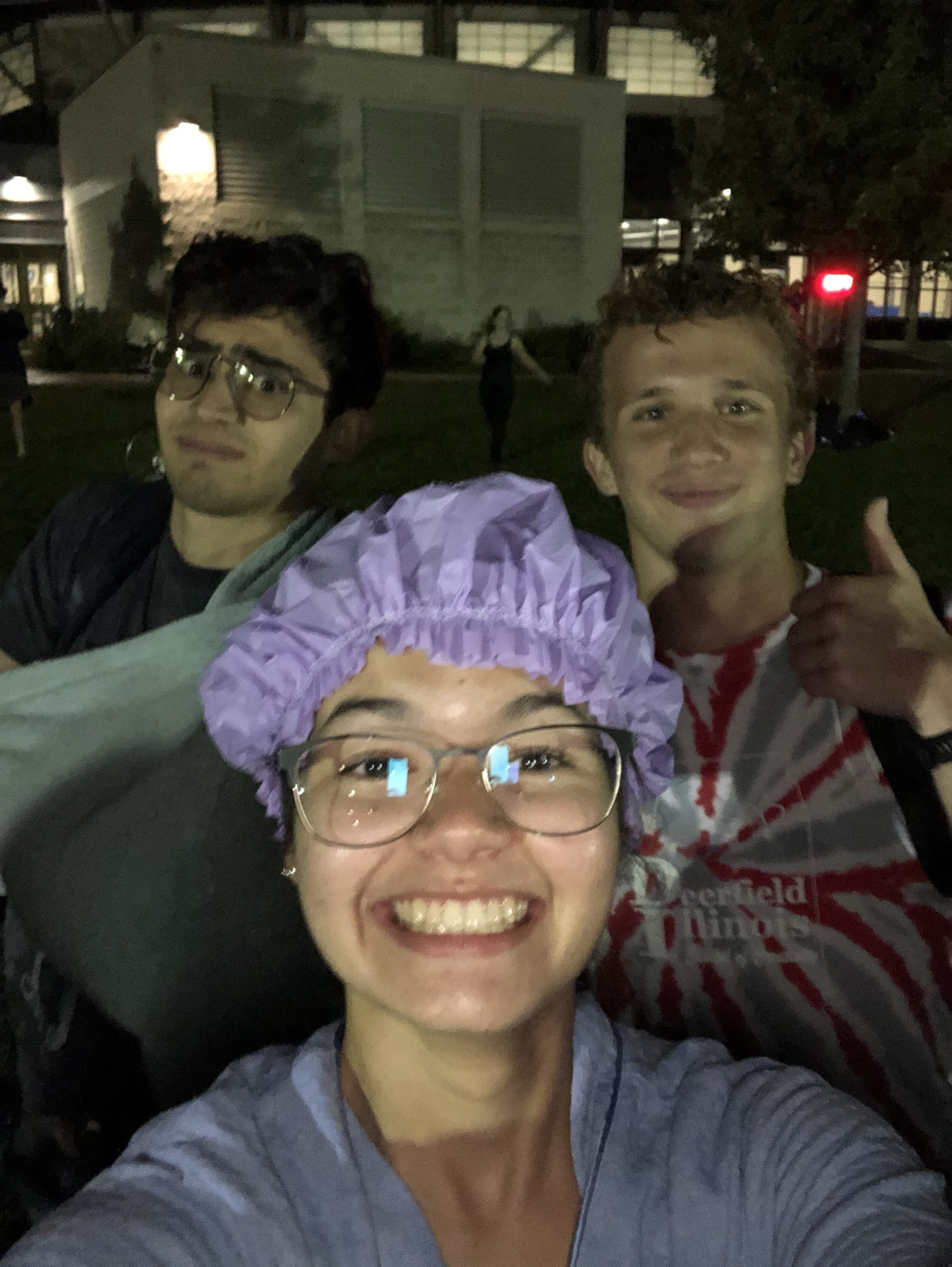 students smile with showergear on