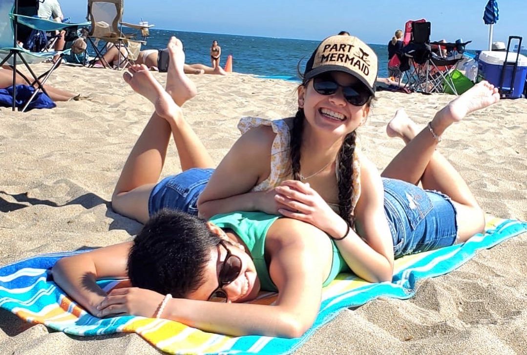 Sisters relax on the beach