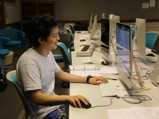 Research assistant at computer