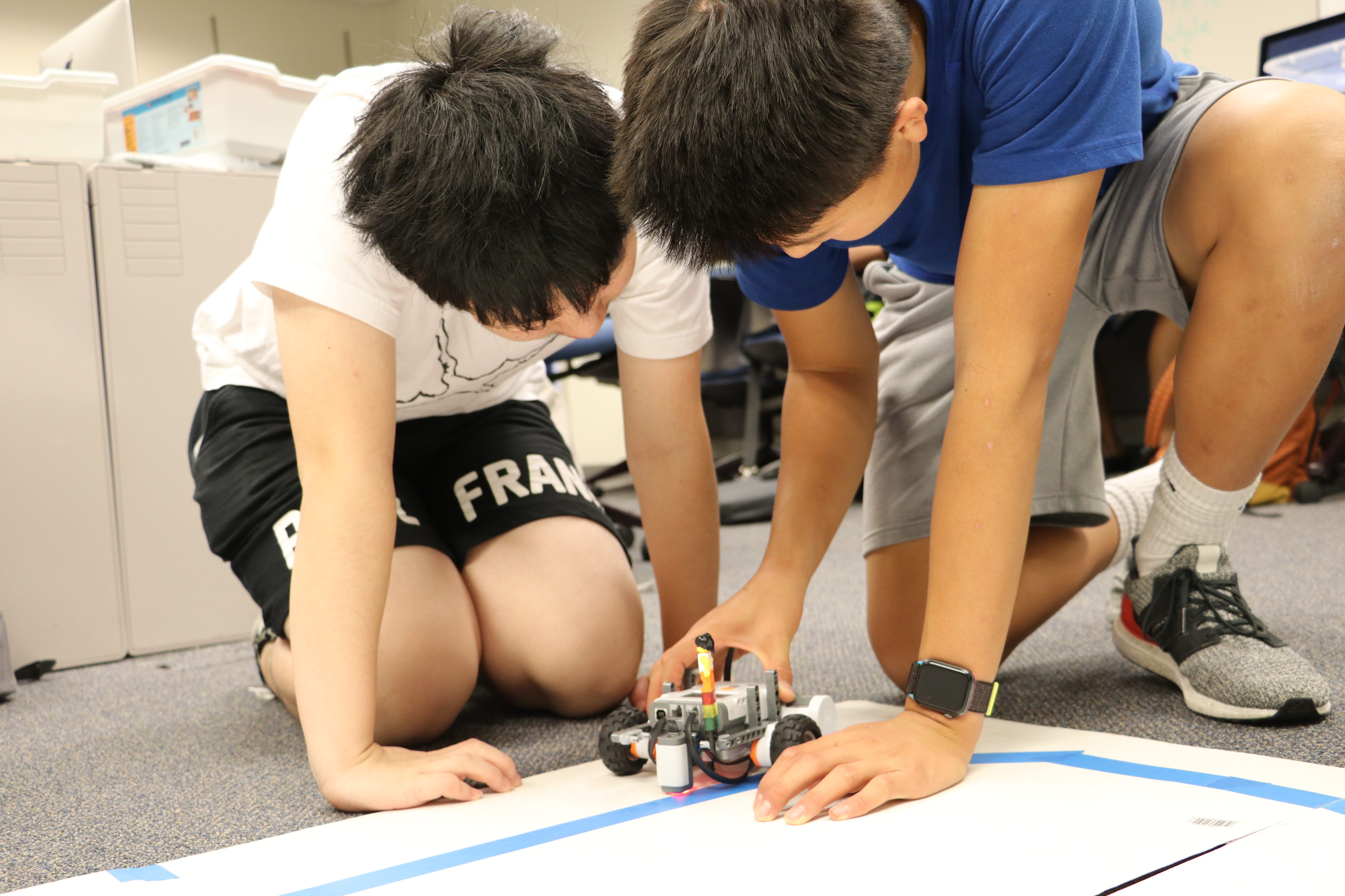 2 robotics students