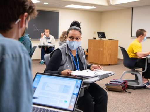 Carleton students in a classroom wearing masks.