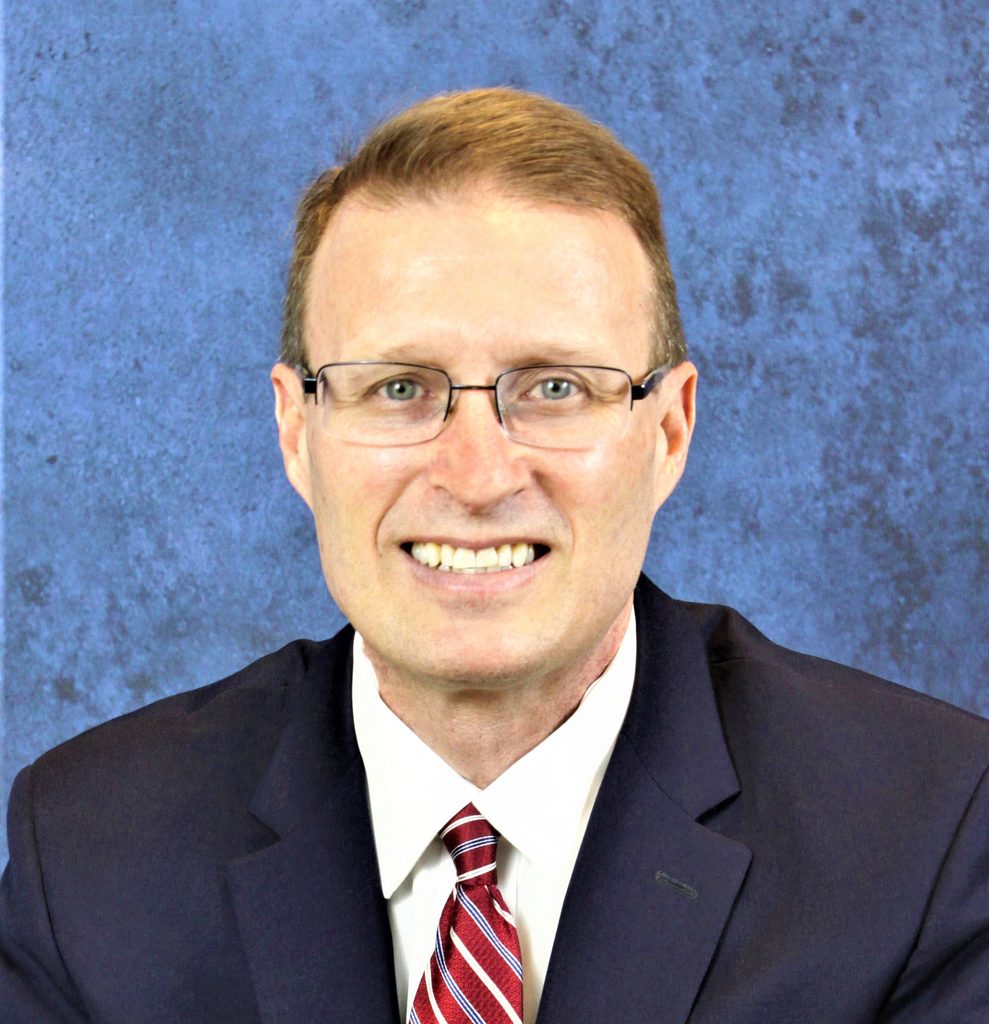 Tim Thull on blue background
