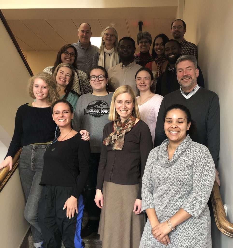 group of people - CEDI leadership board - standing in stairwell for photo
