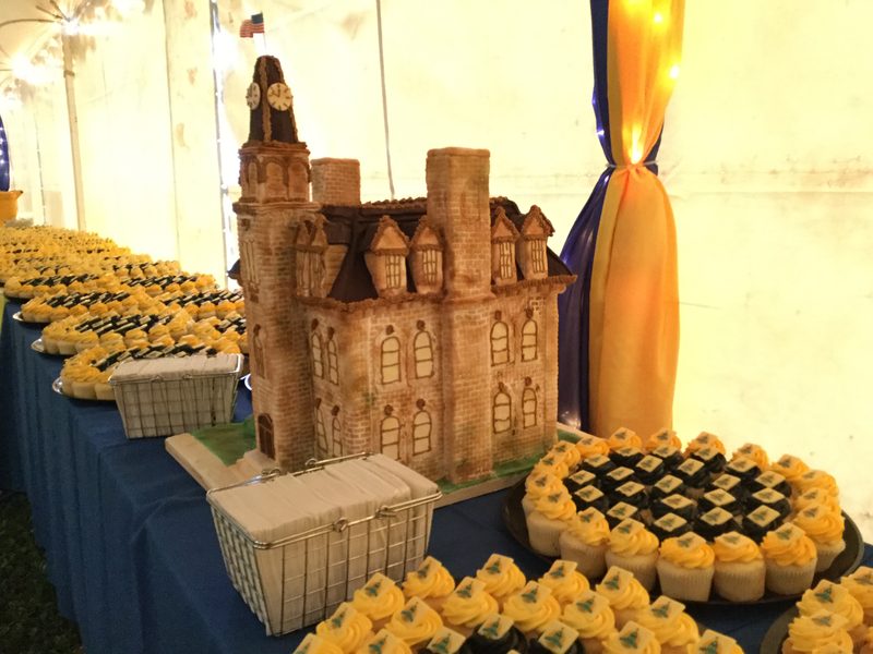 Cake replica of Willis Hall along with 2000 sesquicentennial cupcakes