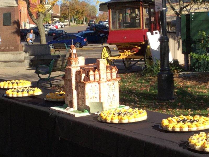 Cake replica of Willis Hall and 500 sesquicentennial cupcakes at Bridge Square October 13
