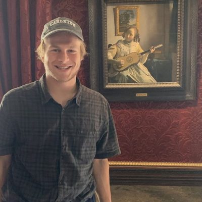 2019 David C. Donelson Fellowship recipient Hugo Caplow with a painting by Johannes Vermeer