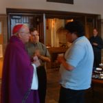 Archbishop Harry Flynn with Carleton Newman Club leaders.