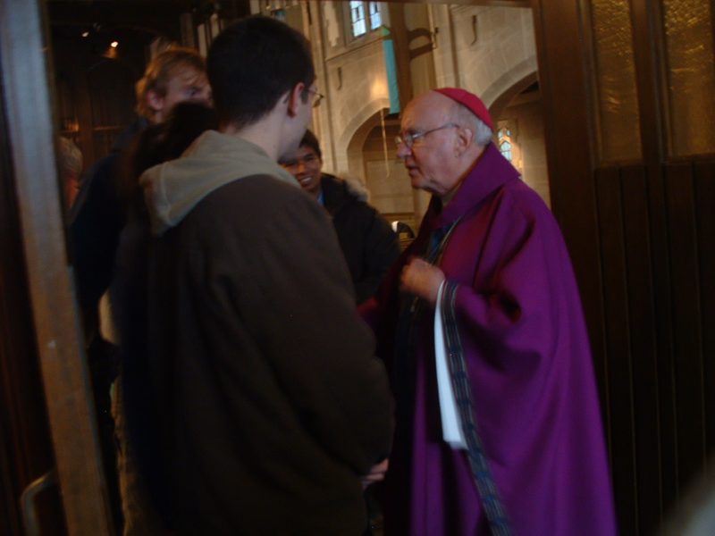 Archbishop Flynn greets students after Mass.