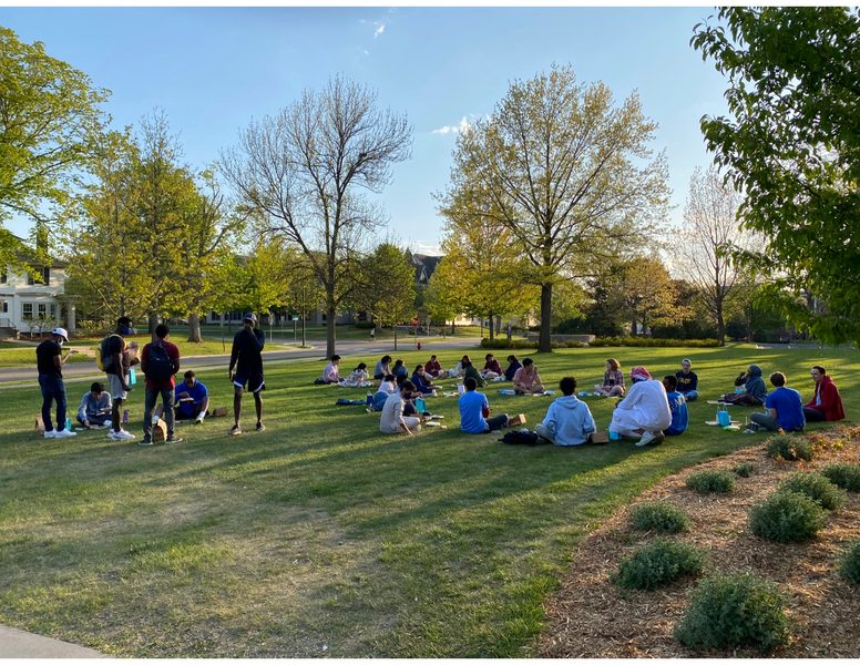 Gathering for Eid al Fitr on front lawn of Chapel