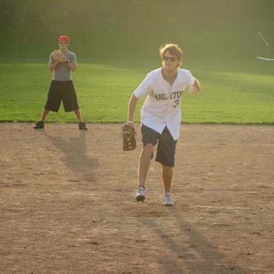 John H pitching the softball.