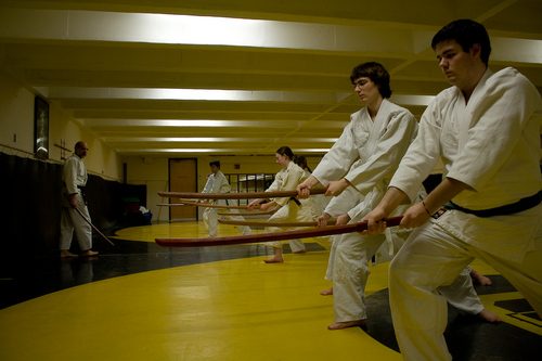Aikido club members practicing