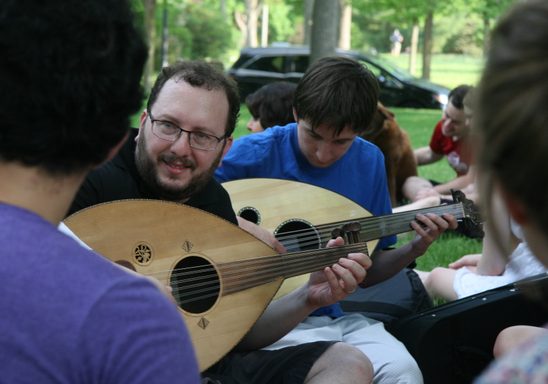 Prof. Yaron Klein and students playing oud at the MIddle East Languages picnic