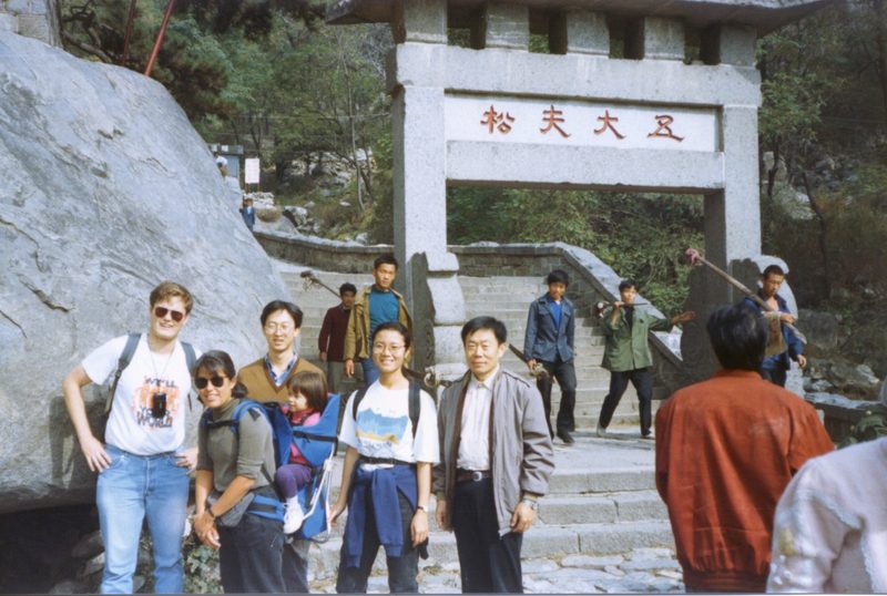 People pose at the Great Wall of China.