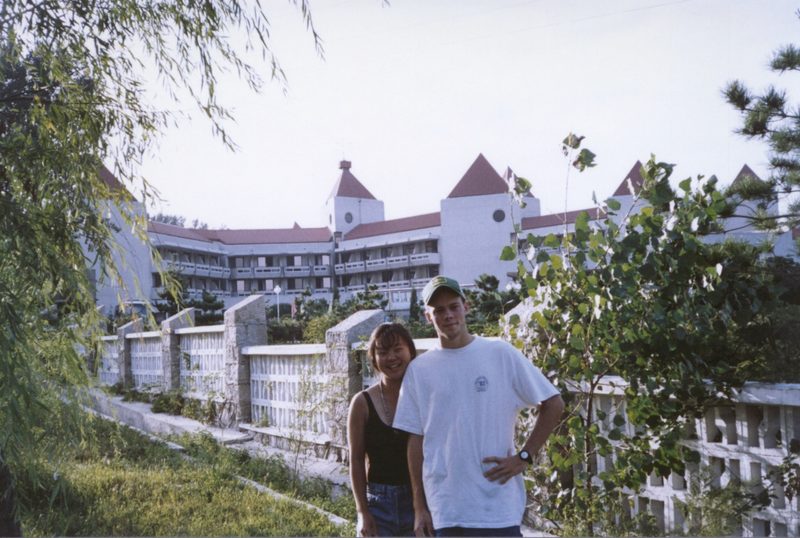 Two Students posing outside Chinese dorm.