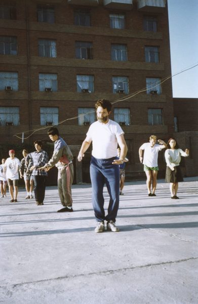 Mark Hansell and students practicing tai chi.