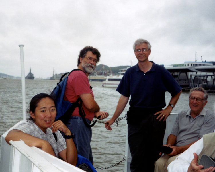 Mark on a boat with others.