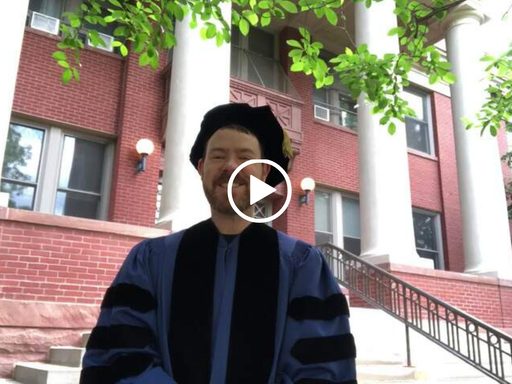 professor in academic regalia