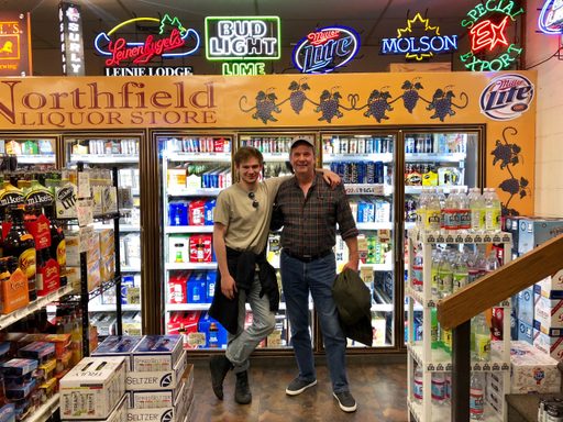 Two people buying beer