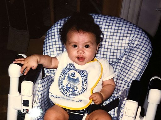 baby wearing a bib